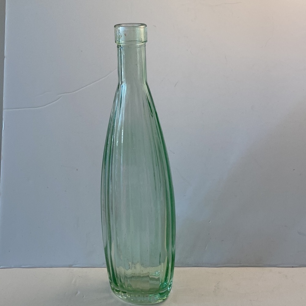 Green glass bottle ribbed unique shape marked vintage oval sea glass pale